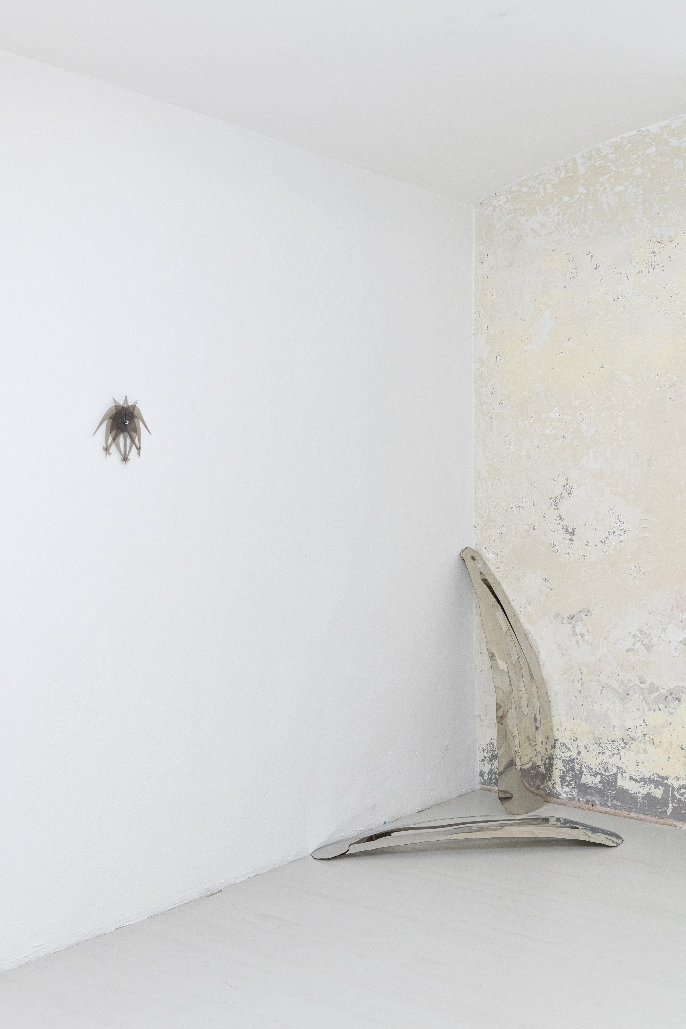 Installation view, Yixuan Hu, 'ever migrate, ever escape', (“而你心中的鸟群，时时要迁徙，时时要逃避”), Plastic, Compass, 27.5 x 21.5 x 3.5 cm, 2025, Jakob Braito, Indie clip: untitled 01 + 02, Stainless steel, 90 x 30 x 10 cm, 2023 